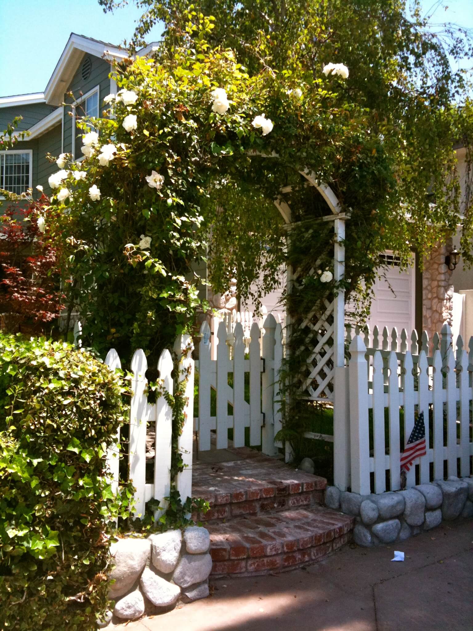 diy curb appeal create a welcoming botanical archway drawn roses