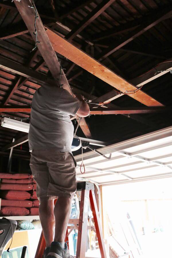 Mark from Scott Electric checking some of the wiring in the rafters