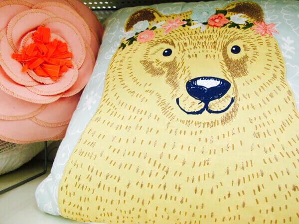 cute-bear-with-flower-pillows
