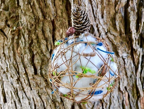Twig ball nesting ornaments offer birdie friends a place to gather nest fluff