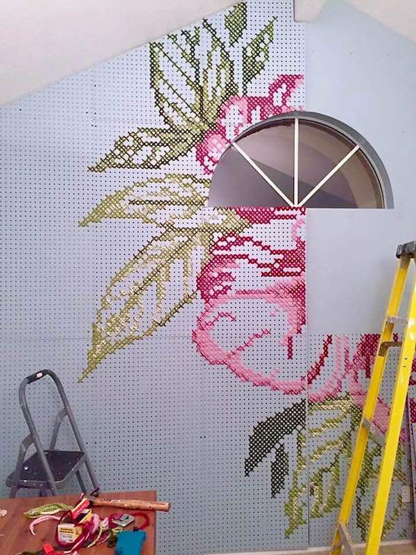 Middle of mounting cross stitch wall