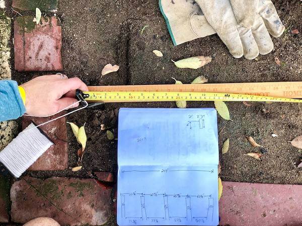 Measure and mark where to dig post holes 