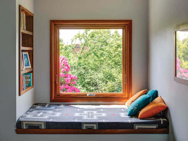 Casement windows offer picture views with a breeze like this sweet window seat nook. photo credit: Milgard's Essence series. 