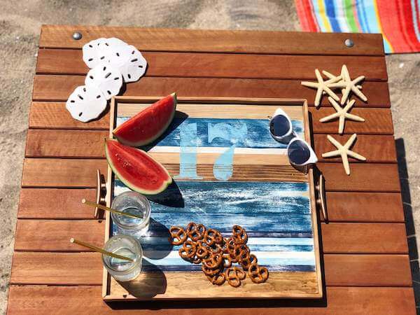 Coastal wooden serving tray with tic-tac-toe on the flip side