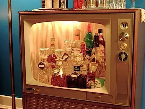 https://www.homejelly.com/wp-content/uploads/2012/04/TV-Liquor-Cabinet-e1341794140820.jpg