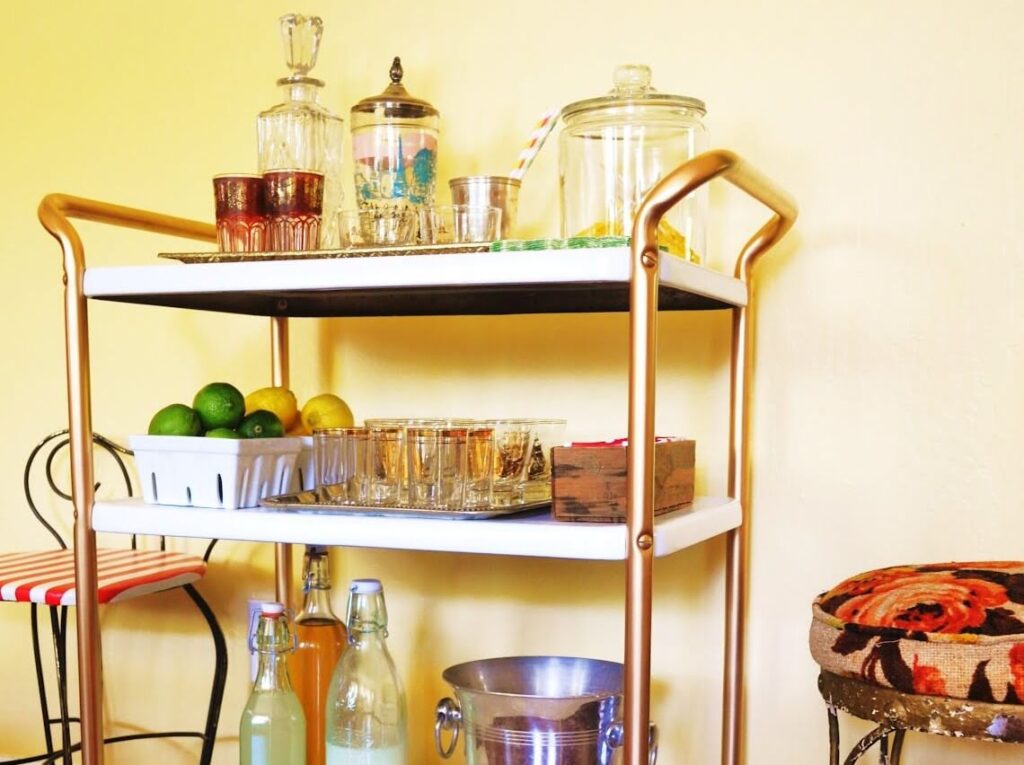 https://www.homejelly.com/wp-content/uploads/2012/05/golden-barred-bar-cart-e1341793079990-1024x765.jpg