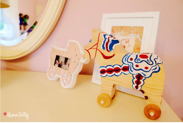 Sweet Swedish Dala horse keeps other decor company