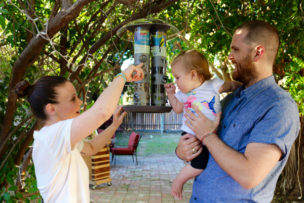 Mom Alexis shows Bing-Bong how a feeder works. "Birder nerds" in the making!