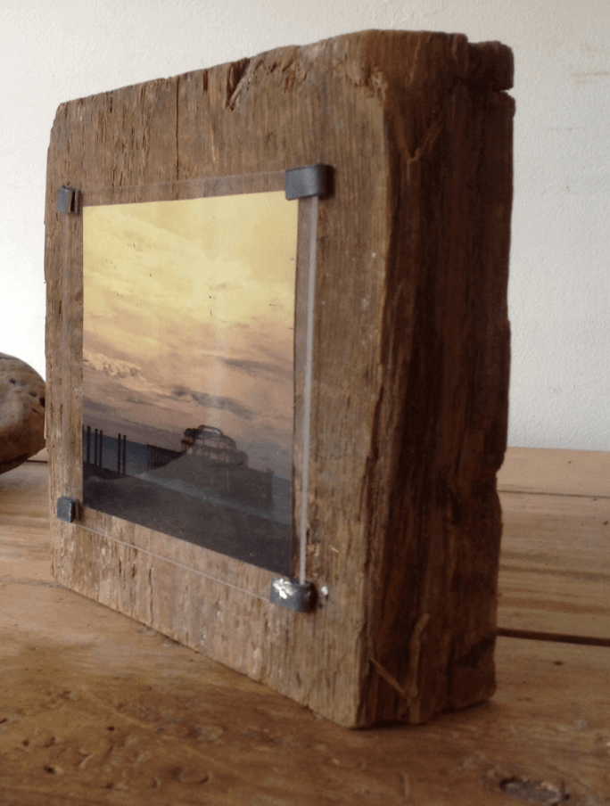 Photography mounted on reclaimed Sea Groyne wood