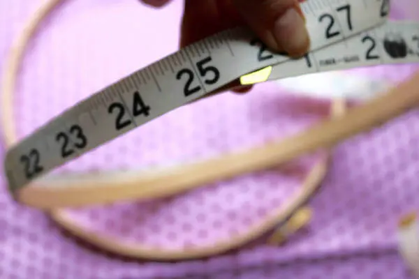 Measure the circumference of the inner ring, then add one inch for the seam
