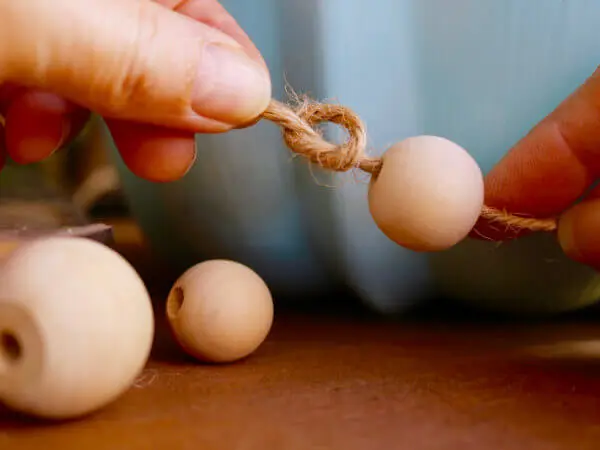 7-knot-off-beads-to-keep-them-in-place