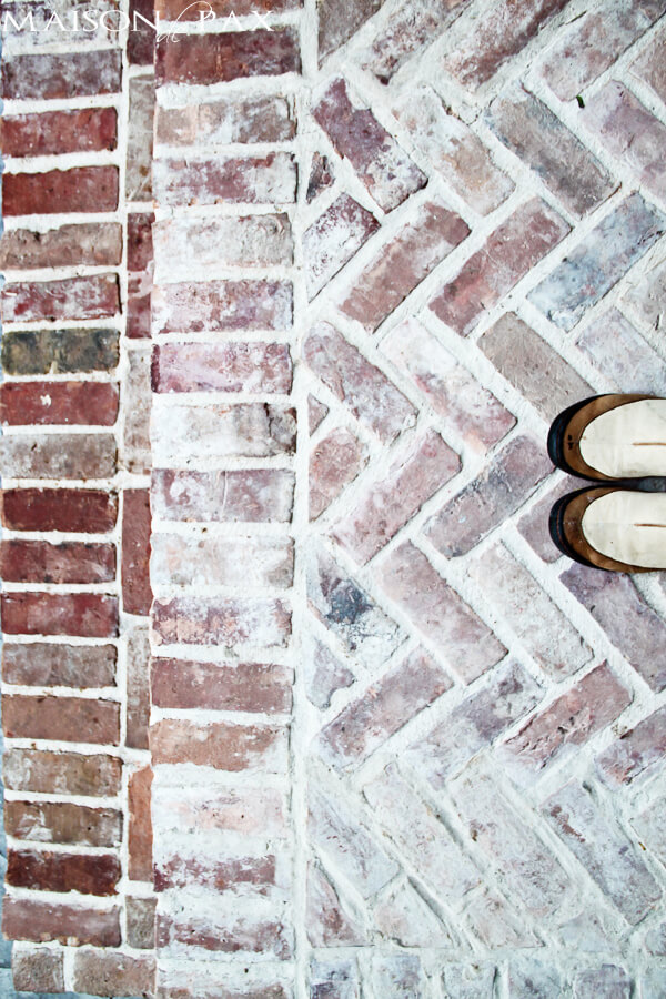 Brick patio with herringbone pattern