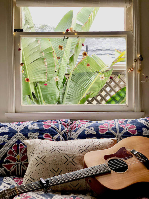 Lighted flower garland brightens a rainy day