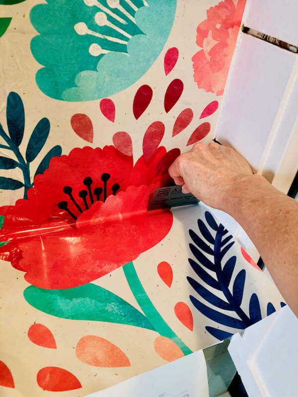 Apply colorful and removable, peel-and-stick wallpaper