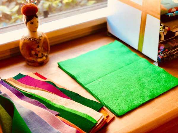 It's helpful to organize your felts and fabric by color