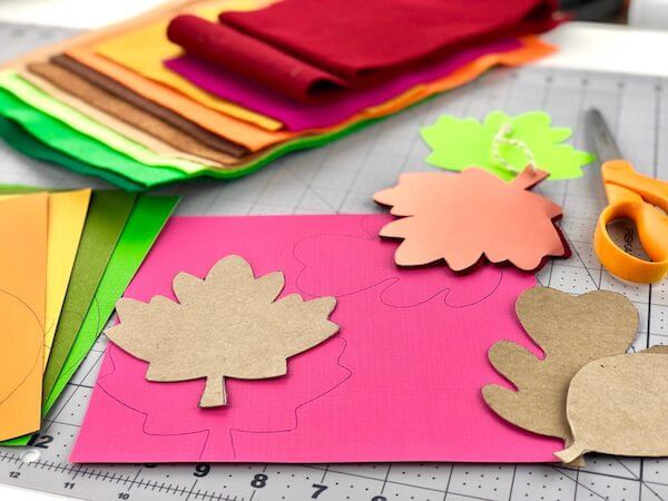 Have fun with colorful papers and felt or go more subdued...whatever your style is, go with that