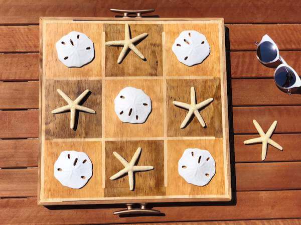 Coastal Tic-Tac-Toe with starfish x's and sand dollar o's