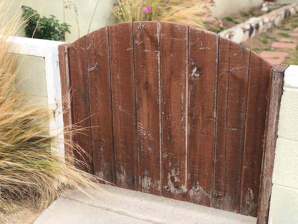 Weathered garden gate still has hope for cuteness