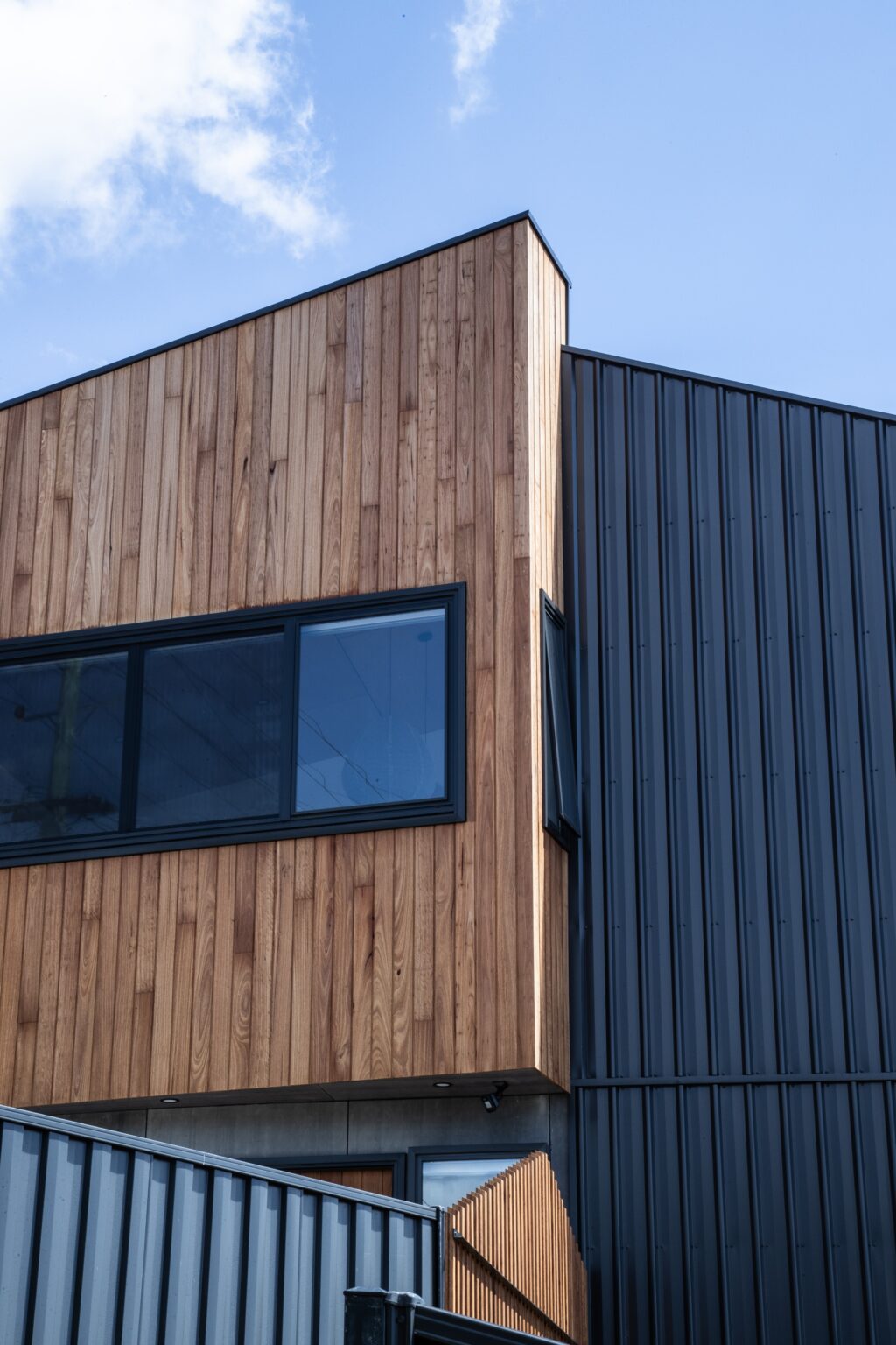 Modern Exterior with mixed siding materials